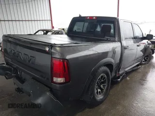 2017 Ram 1500 Rebel z VIN 1C6RR7YT0HS593919, wystawiony jako IAAI lot #41450337 z przebiegiem 164 024 mil mil oraz . Historia ofert i sprzedaży dostępna na DreamBid. Obrazek 4.