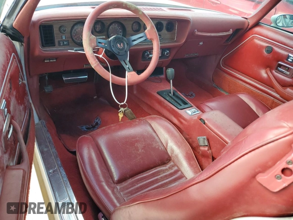 1978 Pontiac Firebird с VIN 2U87K8L123850, выставлен на аукционе Copart как лот 79076374 с пробегом 64 829 миль миль и Списание • Salvage title. История ставок и продаж доступна на DreamBid. Изображение 8.