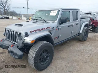 2021 Jeep Gladiator Mojave with VIN 1C6JJTEG9ML519309, listed as a IAAI auction lot 41701544 with 64,461 mi miles and . Bid and sale history available at DreamBid. Image 17.