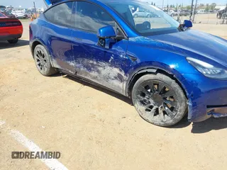 2020 Tesla Model Y Long Range with VIN 5YJYGDEF4LF000494, listed as a IAAI auction lot 41894856 with 118,638 mi miles and . Bid and sale history available at DreamBid. Image 6.