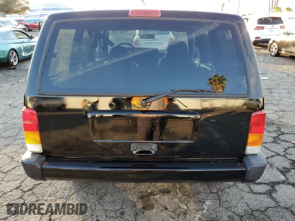 2001 Jeep Cherokee Sport with VIN 1J4FT48S51L568981, listed as a Copart auction lot 82471104 with 181,870 mi miles and Salvage Title. Bid and sale history available at carsss.com. Image 6.