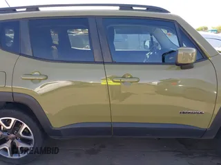 2015 Jeep Renegade Latitude with VIN ZACCJBBT7FPB35993, listed as a IAAI auction lot 42055165 with 65,413 mi miles. Bid and sale history available at carsss.com. Image 14.