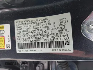 2022 Honda Civic Sedan Sport with VIN 2HGFE2F52NH596002, listed as a IAAI auction lot 41710905 with 33,104 mi miles. Bid and sale history available at carsss.com. Image 9.