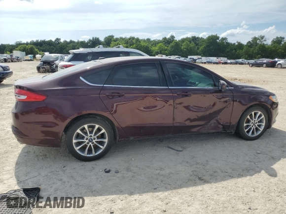 2017 Ford Fusion SE with VIN 3FA6P0H76HR415381, listed as a Copart auction lot 62000325 with 173,319 mi miles and Salvage title. Bid and sale history available at DreamBid. Image 3.