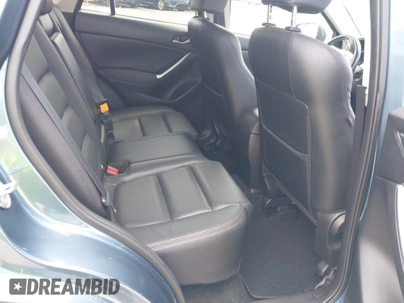 2016 Mazda CX-5 Grand Touring with VIN JM3KE4DY0G0629924, listed as a IAAI auction lot 41878154 with 78,196 mi miles. Bid and sale history available at carsss.com. Image 8.