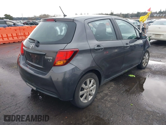 2015 Toyota Yaris L with VIN VNKKTUD38FA043393, listed as a IAAI auction lot 41573010 with 107,146 mi miles and . Bid and sale history available at DreamBid. Image 4.