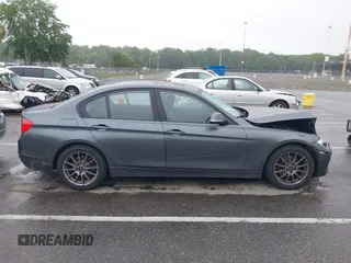 2015 BMW 3 Series 328d xDrive with VIN WBA3D5C5XFK291154, listed as a IAAI auction lot 42445359 with 102,142 mi miles and . Bid and sale history available at DreamBid. Image 13.