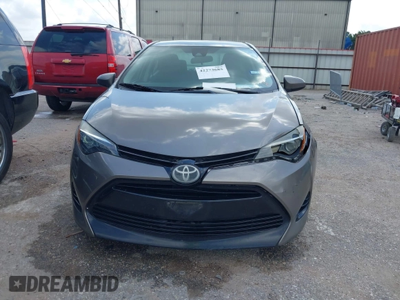 2018 Toyota Corolla L z VIN 5YFBURHE1JP855556, wystawiony jako IAAI lot #42273685 z przebiegiem 165 792 mil mil oraz . Historia ofert i sprzedaży dostępna na DreamBid. Obrazek 12.