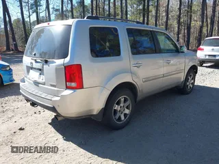 2010 Honda Pilot Touring with VIN 5FNYF4H91AB020868, listed as a IAAI auction lot 41783104 with 298,022 mi miles and . Bid and sale history available at carsss.com. Image 4.