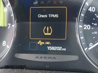 2016 Hyundai Azera Limited z VIN KMHFH4JGXGA568911, wystawiony jako IAAI lot #41428434 z przebiegiem 158 202 mil mil oraz . Historia ofert i sprzedaży dostępna na DreamBid. Obrazek 14.