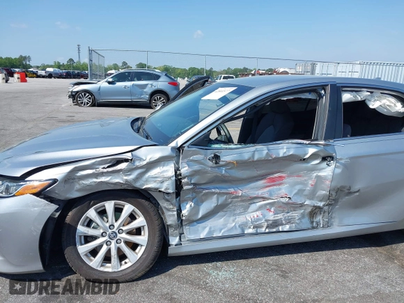 2020 Toyota Camry LE with VIN 4T1C11AK9LU341762, listed as a IAAI auction lot 42001577 with 84,991 mi miles and . Bid and sale history available at DreamBid. Image 6.
