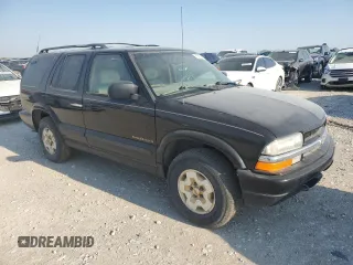 1999 Chevrolet Blazer Trailblazer z VIN 1GNDT13W2X2130625, wystawiony jako Copart lot #50596885 z przebiegiem 187 444 mil mil oraz Czysty tytuł • Clean title. Historia ofert i sprzedaży dostępna na DreamBid. Obrazek 4.