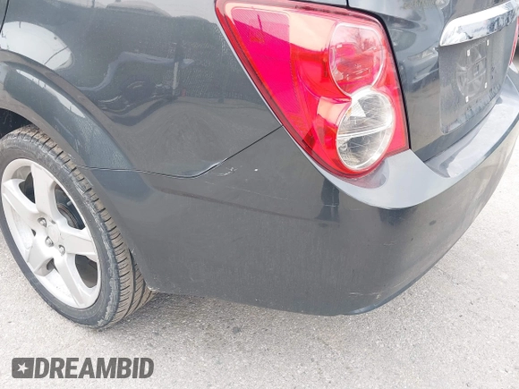 2014 Chevrolet Sonic LTZ with VIN 1G1JE5SB1E4200234, listed as a IAAI auction lot 41850396 with 173,324 mi miles. Bid and sale history available at carsss.com. Image 13.