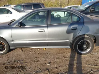 2005 Pontiac Grand Am SE with VIN 1G2NE52E75M151497, listed as a IAAI auction lot 40847757 with 140,300 mi miles. Bid and sale history available at carsss.com. Image 14.