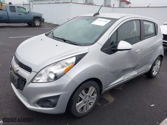 2015 Chevrolet Spark LS with VIN KL8CA6S99FC744012, listed as a IAAI auction lot 41009398 with 137,716 mi miles. Bid and sale history available at carsss.com. Image 2.