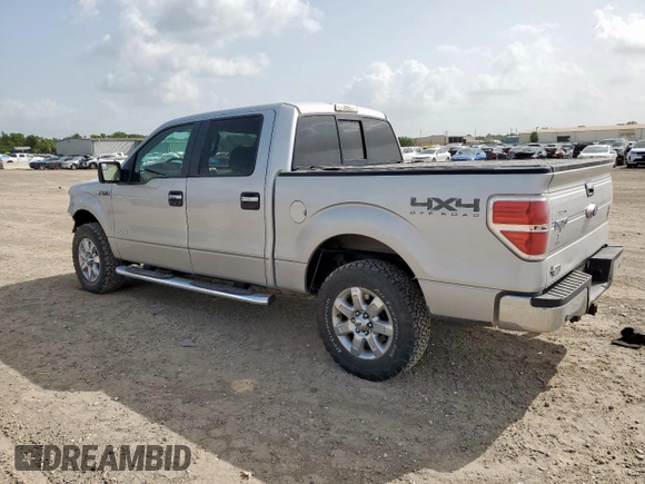 2014 Ford F-150 XL with VIN 1FTFW1ET0EKG04449, listed as a Copart auction lot 62642725 with 223,472 mi miles and Salvage title. Bid and sale history available at DreamBid. Image 2.