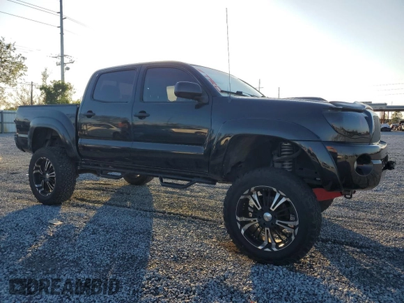 2009 Toyota Tacoma PreRunner with VIN 3TMJU62N19M086594, listed as a Copart auction lot 87074924 with 211,200 mi miles and Salvage Title. Bid and sale history available at carsss.com. Image 4.