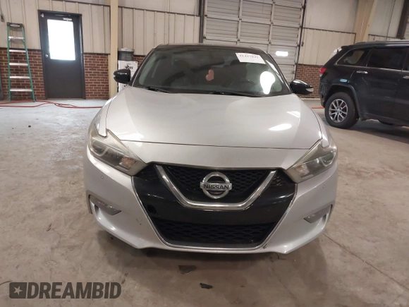 2018 Nissan Maxima SV with VIN 1N4AA6APXJC367526, listed as a IAAI auction lot 41427841 with 113,533 mi miles and . Bid and sale history available at DreamBid. Image 11.