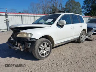 2005 Volkswagen Touareg 4.2L V8 with VIN WVGZM77L15D032276, listed as a IAAI auction lot 41167339 with 213,926 mi miles and . Bid and sale history available at DreamBid. Image 2.