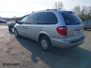 2005 Chrysler Town & Country LX with VIN 2C4GP44R45R180459, listed as a IAAI auction lot 41981462 with 143,396 mi miles. Bid and sale history available at carsss.com. Image 3.