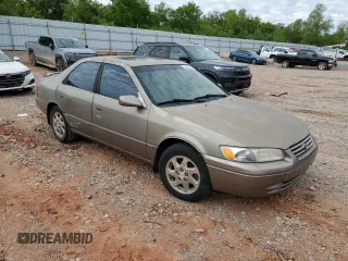 1999 Toyota Camry LE z VIN JT2BF28K9X0199531, wystawiony jako Copart lot #55637275 z przebiegiem Nie podano mil oraz Szkoda całkowita • Salvage title. Historia ofert i sprzedaży dostępna na DreamBid. Obrazek 4.