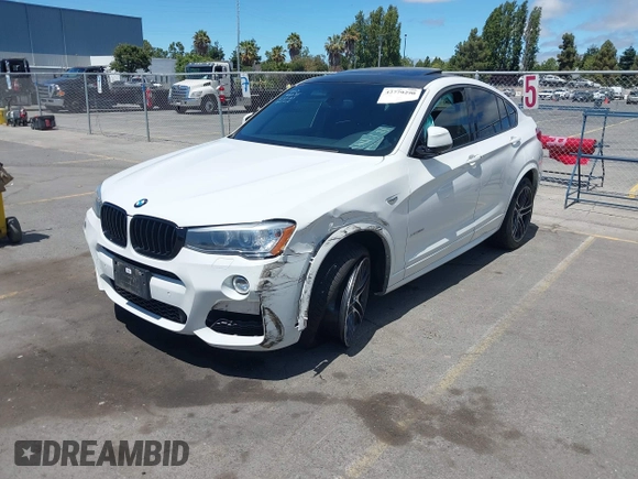 2015 BMW X4 xDrive28i with VIN 5UXXW3C5XF0M89147, listed as a IAAI auction lot 42779290 with 120,773 mi miles and . Bid and sale history available at DreamBid. Image 6.