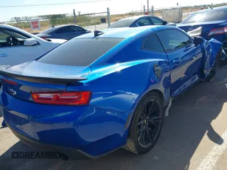 2017 Chevrolet Camaro 1LT z VIN 1G1FB1RS2H0158584, wystawiony jako IAAI lot #40488502 z przebiegiem 92 684 mil mil oraz . Historia ofert i sprzedaży dostępna na DreamBid. Obrazek 13.