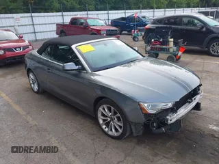 2014 Audi A5 Premium with VIN WAUAFAFH5EN001299, listed as a IAAI auction lot 42732633 with 158,144 mi miles and . Bid and sale history available at DreamBid. Image 1.
