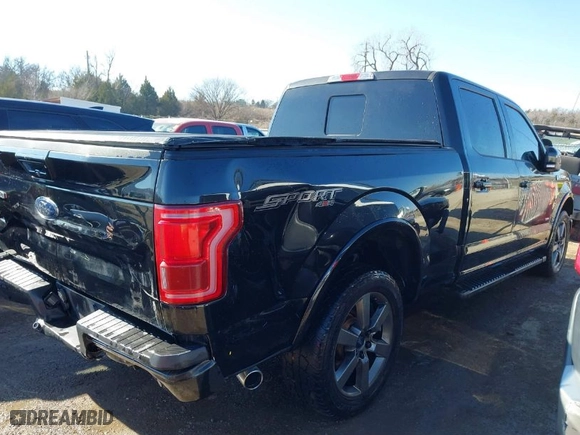 2015 Ford F-150 XLT w/HD Payload Pkg with VIN 1FTFW1EG4FFC97087, listed as a IAAI auction lot 41282930 with 121,506 mi miles. Bid and sale history available at carsss.com. Image 4.