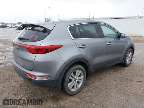 2017 Kia Sportage LX with VIN KNDPM3AC6H7233672, listed as a IAAI auction lot 42215738 with 130,112 mi miles and . Bid and sale history available at carsss.com. Image 4.