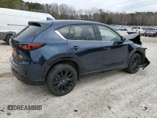 2022 Mazda CX-5 2.5 Turbo with VIN JM3KFBAY3N0603921, listed as a Copart auction lot 43679495 with 27,073 mi miles and Salvage Title. Bid and sale history available at carsss.com. Image 3.