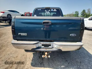 1999 Ford F-250 XL with VIN 1FTNX21FXXEC41173, listed as a Copart auction lot 65117905 with 303,358 mi miles and Clean title. Bid and sale history available at DreamBid. Image 6.
