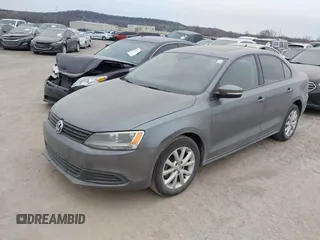 2011 Volkswagen Jetta Sedan SE w/Convenience & Sunroof with VIN 3VWDX7AJ8BM306437, listed as a IAAI auction lot 41714664 with 234,948 mi miles. Bid and sale history available at carsss.com. Image 2.