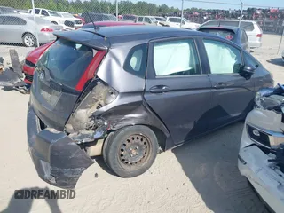 2015 Honda Fit LX with VIN 3HGGK5H52FM771511, listed as a IAAI auction lot 42132749 with 96,666 mi miles and . Bid and sale history available at DreamBid. Image 4.