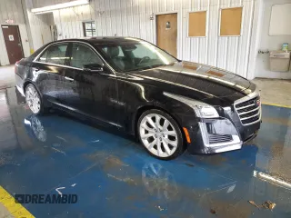 2015 Cadillac CTS Premium AWD z VIN 1G6AZ5S3XF0127669, wystawiony jako Copart lot #56314865 z przebiegiem 211 973 mil mil oraz Czysty tytuł • Clean title. Historia ofert i sprzedaży dostępna na DreamBid. Obrazek 4.