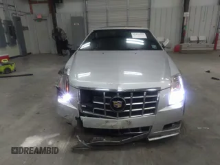 2012 Cadillac CTS Performance with VIN 1G6DJ1E31C0110232, listed as a IAAI auction lot 41185119 with 140,298 mi miles and . Bid and sale history available at DreamBid. Image 13.