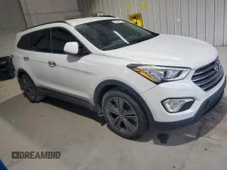2016 Hyundai Santa Fe Premium z VIN KM8SNDHF6GU144631, wystawiony jako Copart lot #62164255 z przebiegiem 123 484 mil mil oraz Czysty tytuł • Clean title. Historia ofert i sprzedaży dostępna na DreamBid. Obrazek 4.