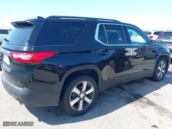 2019 Chevrolet Traverse LT Leather with VIN 1GNERHKWXKJ162413, listed as a IAAI auction lot 39414631 with 87,466 mi miles. Bid and sale history available at carsss.com. Image 4.