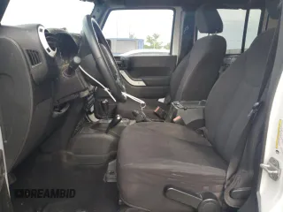 2013 Jeep Wrangler Unlimited Sport z VIN 1C4BJWDG0DL574795, wystawiony jako Copart lot #59230515 z przebiegiem 132 808 mil mil oraz Szkoda całkowita • Salvage title. Historia ofert i sprzedaży dostępna na DreamBid. Obrazek 7.