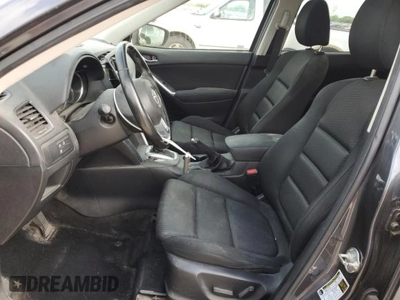 2015 Mazda CX-5 Touring with VIN JM3KE4CY0F0517821, listed as a Copart auction lot 53937195 with 165,852 mi miles and Salvage Title. Bid and sale history available at DreamBid. Image 7.