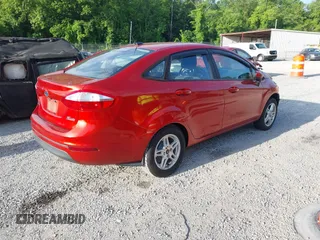 2019 Ford Fiesta SE z VIN 3FADP4BJXKM122235, wystawiony jako IAAI lot #42457164 z przebiegiem 103 265 mil mil oraz . Historia ofert i sprzedaży dostępna na DreamBid. Obrazek 4.