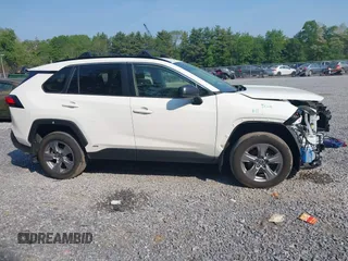 2023 Toyota RAV4 Hybrid LE with VIN JTMLWRFV3PD188020, listed as a IAAI auction lot 42424244 with 69,863 mi miles and . Bid and sale history available at DreamBid. Image 13.