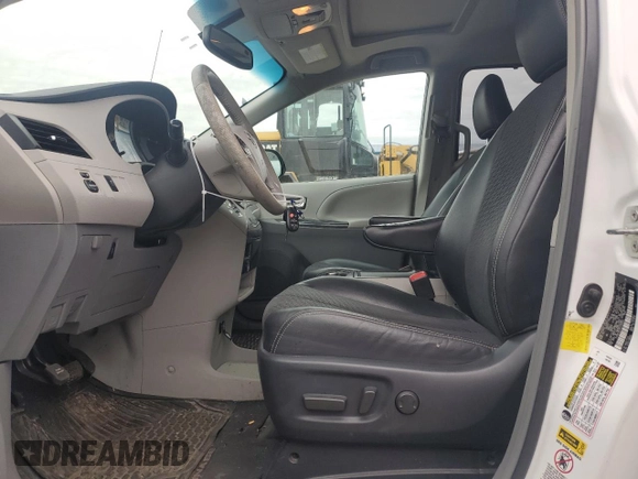 2012 Toyota Sienna SE with VIN 5TDXK3DC6CS185557, listed as a Copart auction lot 53316495 with 131,898 mi miles and Salvage Title. Bid and sale history available at carsss.com. Image 7.