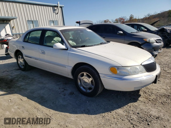 2002 Lincoln Continental with VIN 1LNHM97V62Y643532, listed as a Copart auction lot 76015984 with 154,374 mi miles and Salvage Title. Bid and sale history available at carsss.com. Image 4.