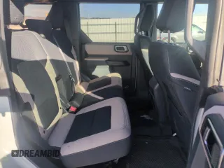 2021 Ford Bronco z VIN 1FMDE5DH7MLA94152, wystawiony jako Copart lot #53561445 z przebiegiem 35 965 mil mil oraz Szkoda całkowita • Salvage title. Historia ofert i sprzedaży dostępna na DreamBid. Obrazek 11.