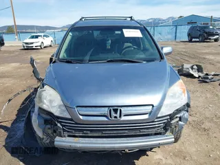2009 Honda CR-V EX-L with VIN JHLRE48749C021076, listed as a IAAI auction lot 41884588 with 149,091 mi miles and . Bid and sale history available at carsss.com. Image 13.