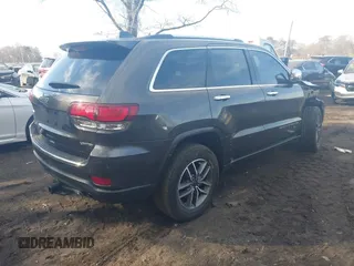 2021 Jeep Grand Cherokee 80th Anniversary with VIN 1C4RJFBG8MC637210, listed as a IAAI auction lot 41629628 with 40,637 mi miles and . Bid and sale history available at DreamBid. Image 4.