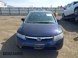 2007 Honda Civic Sdn LX with VIN 1HGFA16587L124463, listed as a IAAI auction lot 42042736 with 189,929 mi miles. Bid and sale history available at carsss.com. Image 13.