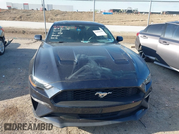 2021 Ford Mustang EcoBoost with VIN 1FA6P8TH0M5107683, listed as a IAAI auction lot 42084509 with 63,015 mi miles and . Bid and sale history available at DreamBid. Image 12.