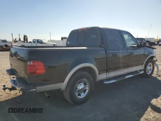 2003 Ford F-150 XLT with VIN 1FTRW07L73KA28876, listed as a Copart auction lot 49319565 with 290,880 mi miles and Salvage Title. Bid and sale history available at carsss.com. Image 3.